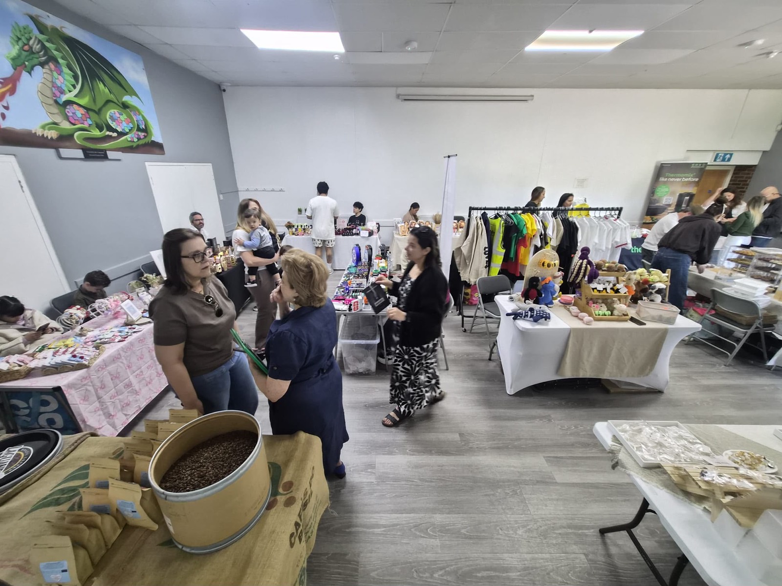 Wide view of the market hall in full swing