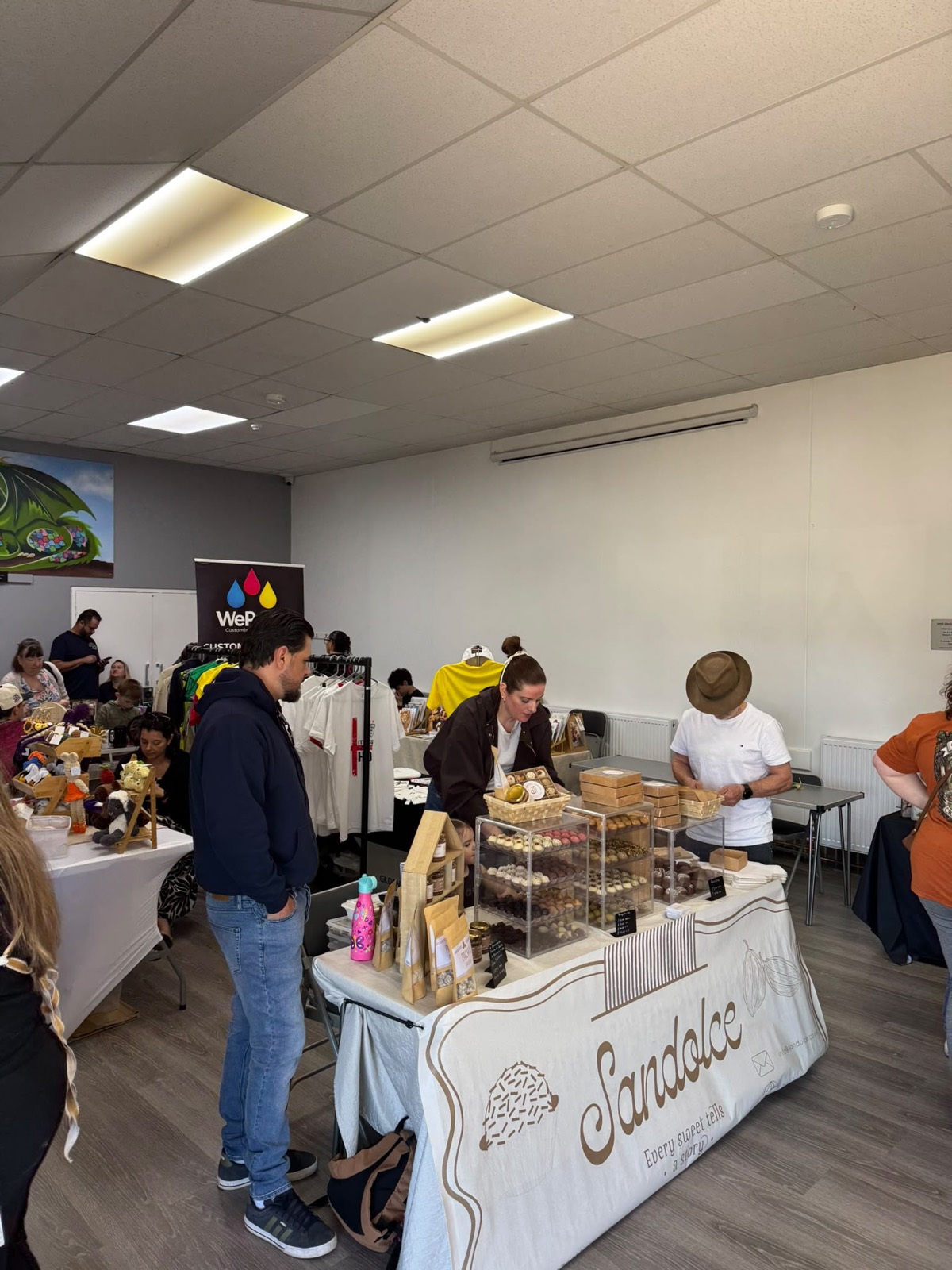 Visitors browsing the Sandolce sweets stall
