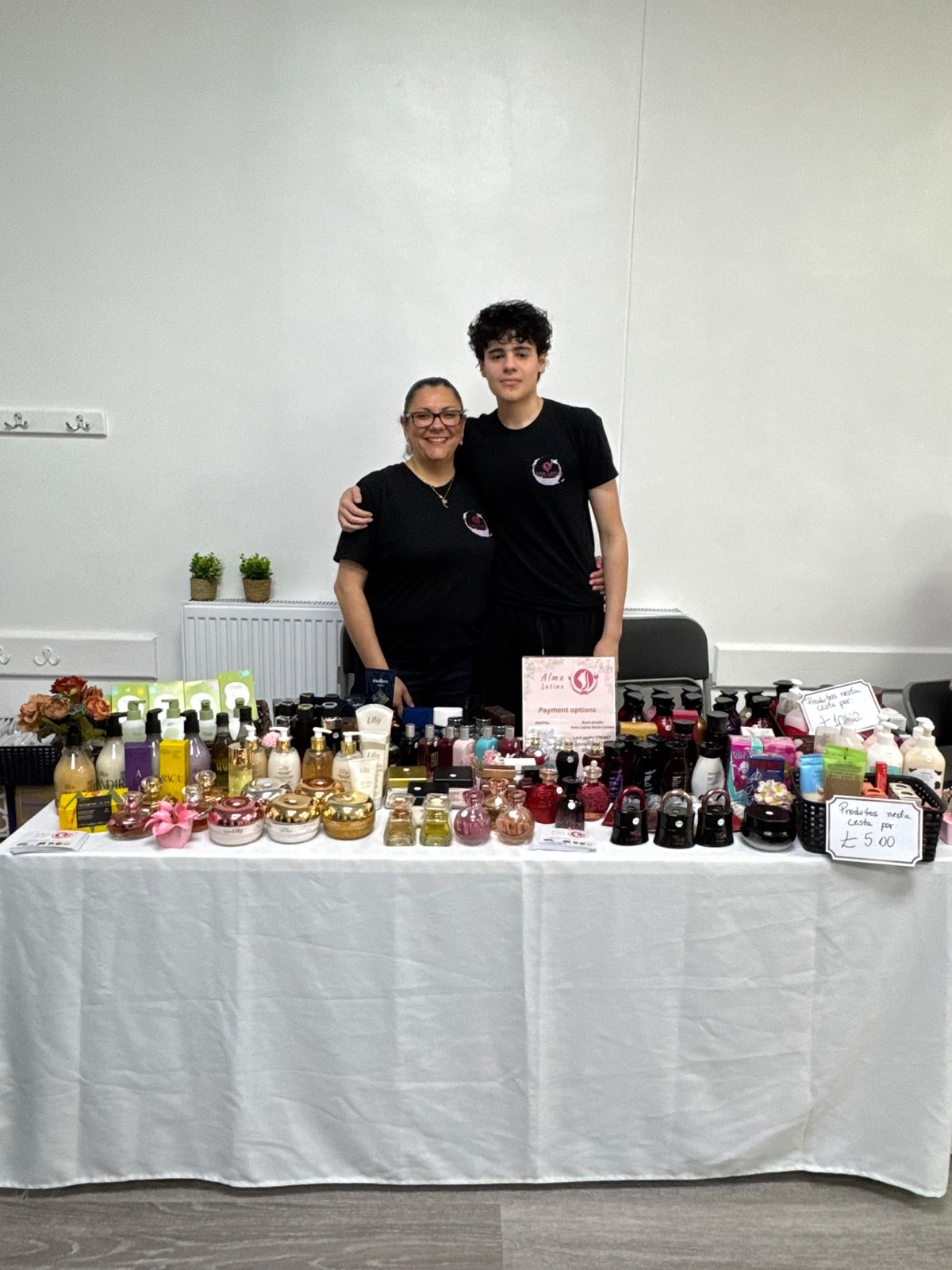 Makers behind their table of preserves and treats
